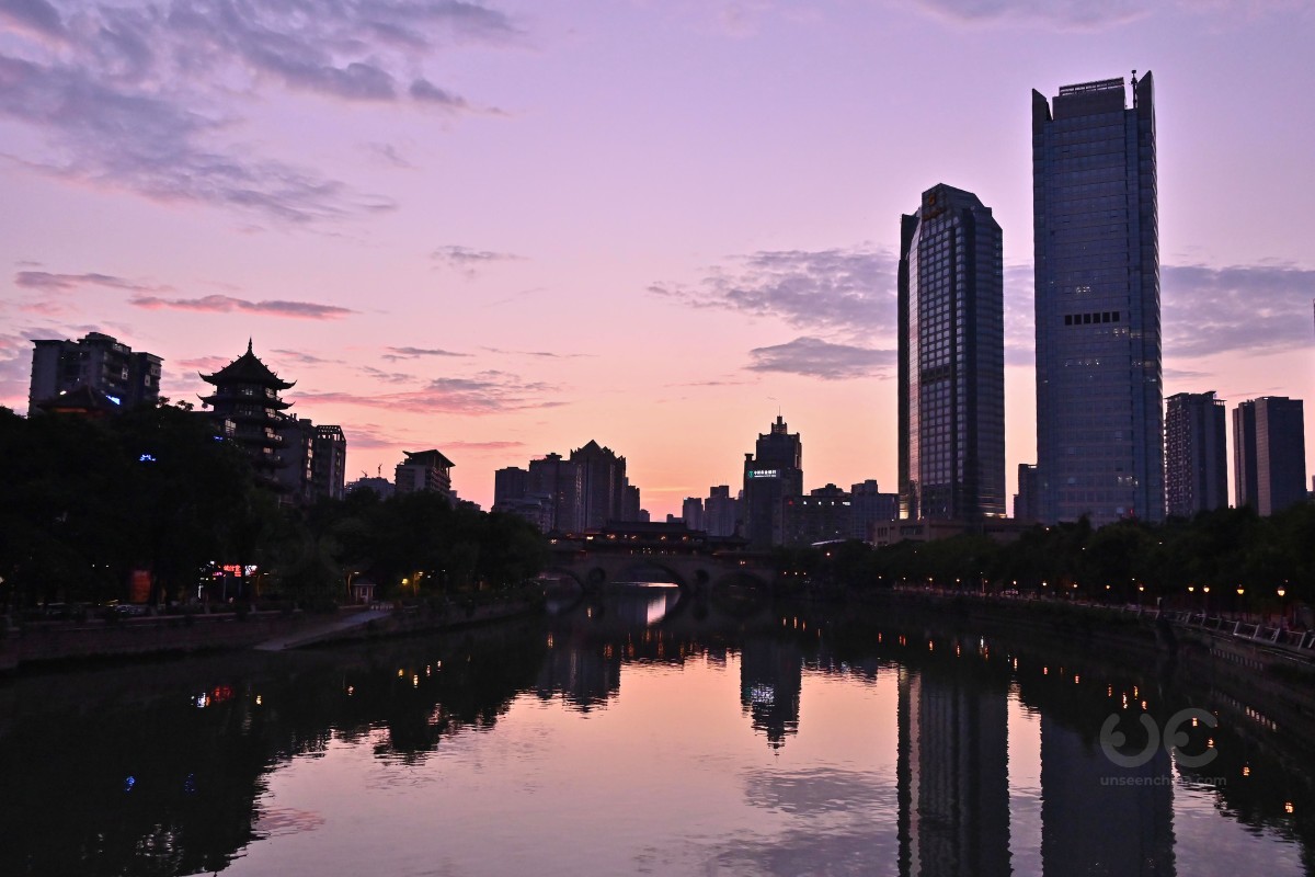 Beautiful Chengdu City View at Dusk Time and the River Reflects Building to the water